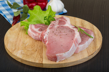 Raw t-bone steak
