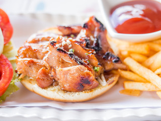 Yummy chicken burger with fries