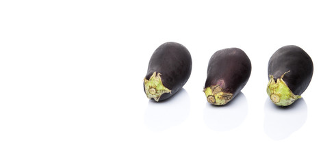 Black skinned eggplant over white background