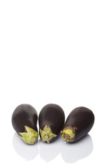 Black skinned eggplant over white background