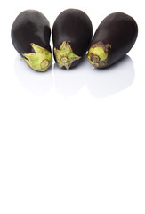 Black skinned eggplant over white background