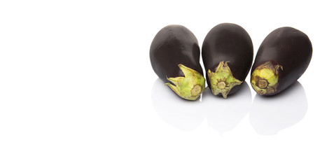 Black skinned eggplant over white background