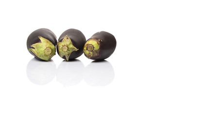 Black skinned eggplant over white background