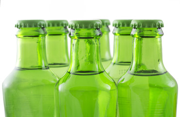 green bottles of soda water