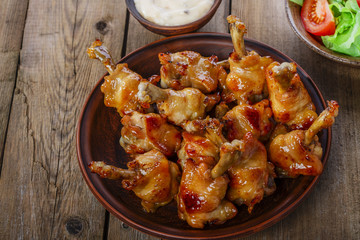 honey glazed chicken wing with sauce