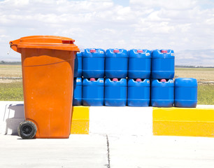 Blue chemical barrels stacked up.