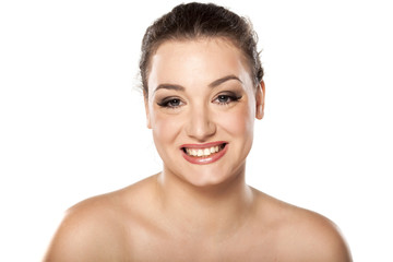 Obraz premium happy young woman on a white background