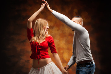 Young couple dances Caribbean Salsa