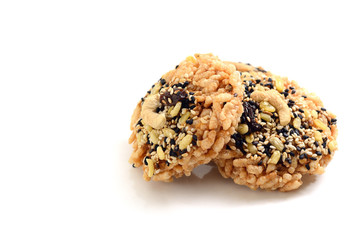Dried rice biscuit and sprinkle ground sesame mixed with dry soy
