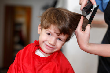 Little boy at barber © sakkmesterke