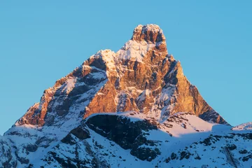 Rideaux velours Cervin cervino matterhorn mountain in a winter sunrise