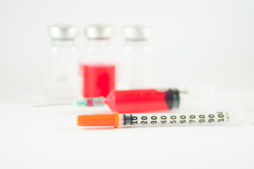 Disposable syringe and injection vials background