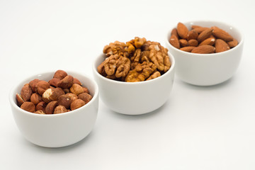 Mix of nuts in the bowls