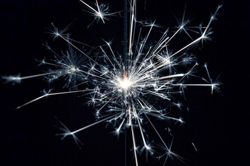 Celebrate party sparkler little fireworks on black background