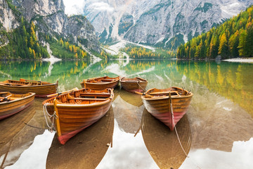 Closeup on boats on lake braies in south tyrol, italy © Alliance