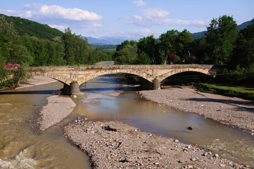 Fototapeta na wymiar mountain river and bridge