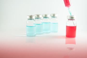 Action of liquid pump from vial by syringe