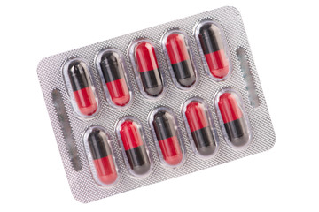 Red and black capsule in blister pack