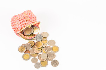 coins with wallet on white background