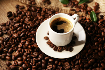 Cup of coffee on wooden table