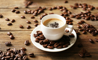 Cup of coffee on wooden table