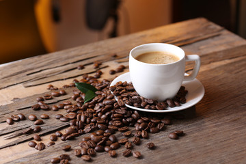Cup of coffee on wooden table