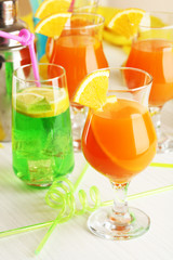 Glasses of fruit cocktails in party close-up