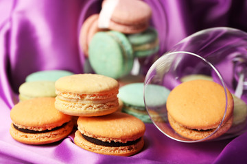 Gentle colorful macaroons in wine glass