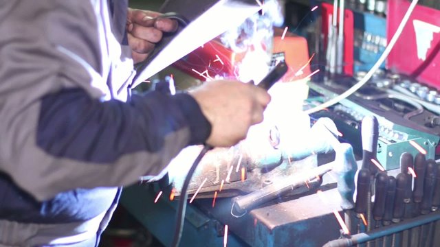 Welder with Welding Electrode on the Workbench Vice