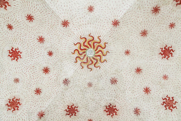 Painted coat of arms with dragon on ceiling