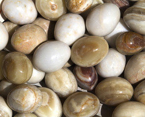 Fototapeta na wymiar Egg shaped rocks piled together