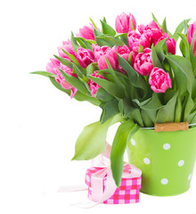 bouquet of multicolored   tulip flowers in white pot