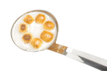 Kūčiukai in the ladle isolated