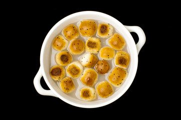 Kuciukai Lithuanian food served with poppy seeds milk