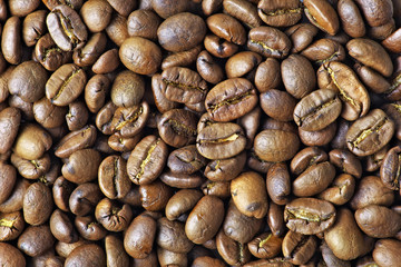 Roasted coffee beans, can be used as a background.