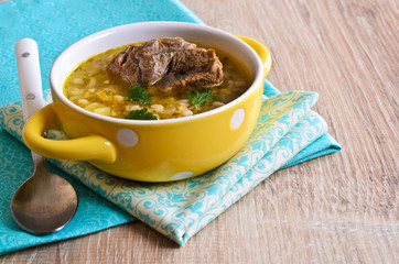 Soup with pearl barley and meat