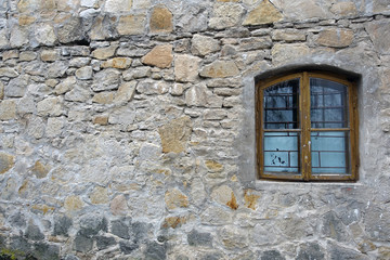 Fototapeta na wymiar Old brick wall with window