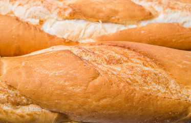 Fresh French baguette close up view