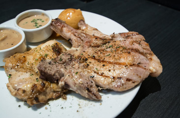 Pork chop and chicken with gravy