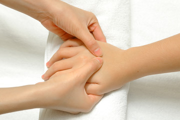 Fototapeta na wymiar Hand and finger massage in relax spa