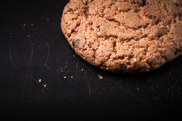 Oat cookies on the old shabby background. tinted. with space for