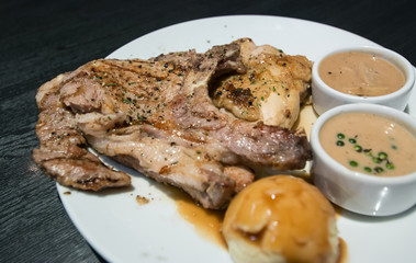 Pork chop and chicken with gravy 