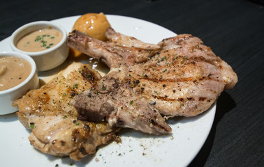 Pork chop and chicken with gravy