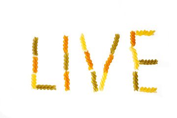 live written with pasta spirals on white background