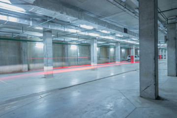 Car lights in the underground city parking.