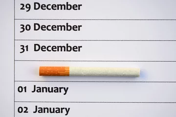 Deurstickers Sigaret op kalender, agenda © trinetuzun