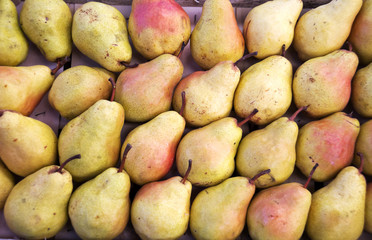 Close up view of pears on market stand