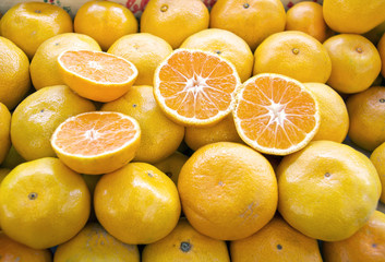 Bunch of fresh mandarin oranges on market