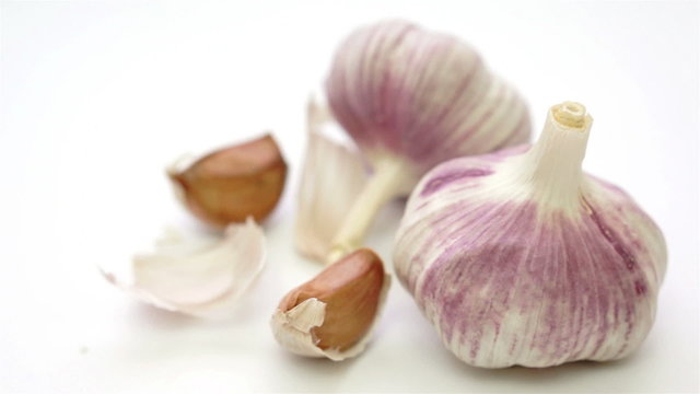 Garlic Cloves Skins Dolly on White