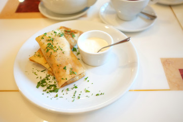 Tasty pancakes on plate in cafe